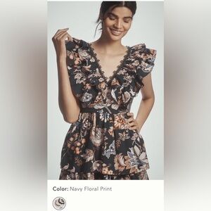 By Anthropologie sleeveless ruffled A line mini dress.